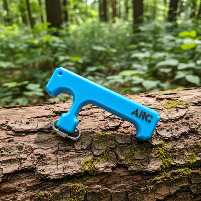 Blue T-Bar Hunting Drag with 'ARC' branding on a dark surface